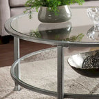 Table basse ronde Glenn de SEI Furniture, argent vieilli, avec plateau en verre et étagère