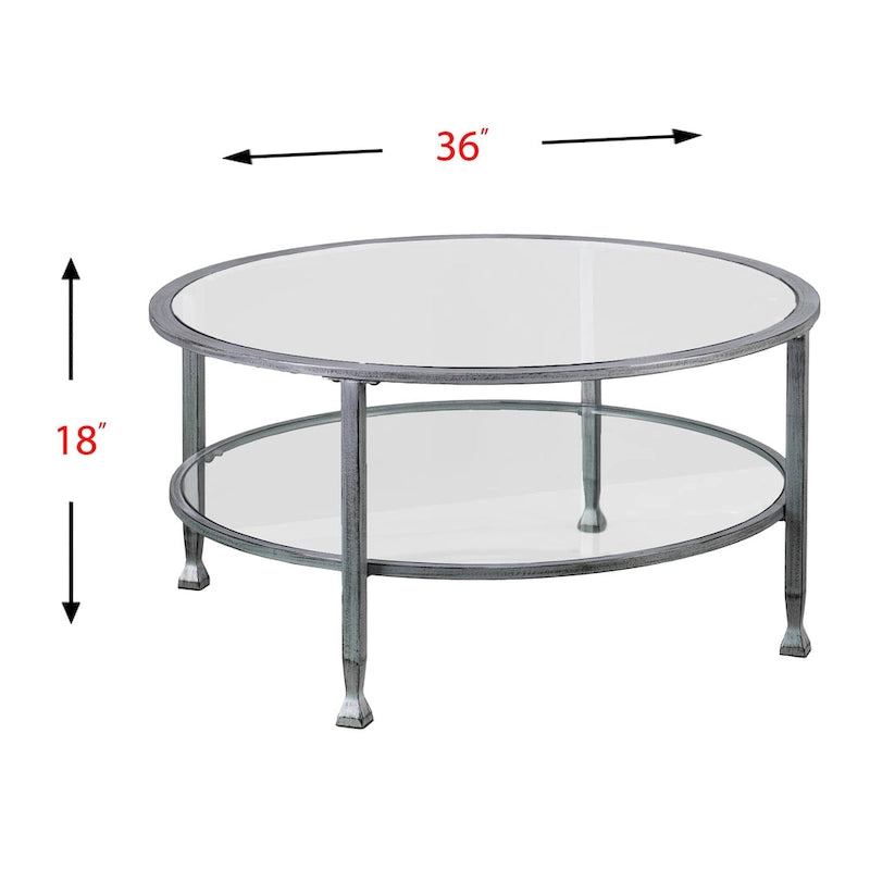 Table basse ronde Glenn de SEI Furniture, argent vieilli, avec plateau en verre et étagère