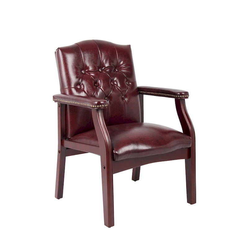 Fauteuil visiteur en vinyle capitonné Boss avec clous décoratifs en laiton antique